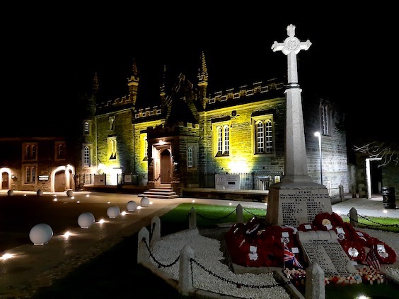 Tavistock War Memorial and Guildhall at night.